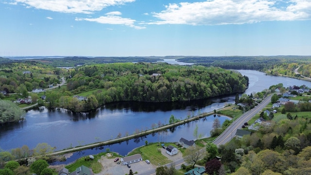 590 Main St, East Machias, ME 04630 - aerial overview of property's location with a heavily wooded area and a large body of water