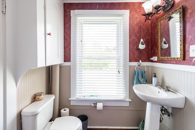 590 Main St, East Machias, ME 04630 - bathroom with a wainscoted wall and toilet