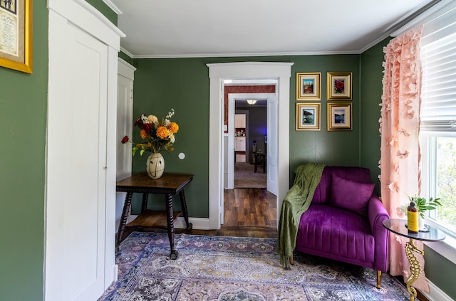 590 Main St, East Machias, ME 04630 - sitting room with wood finished floors, ornamental molding, and baseboards