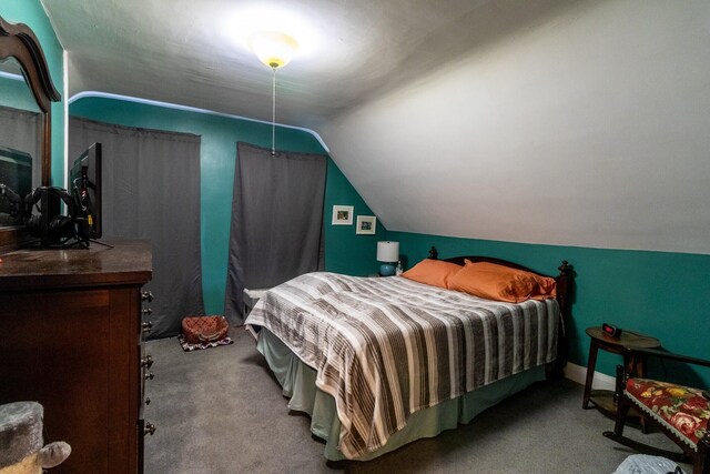 590 Main St, East Machias, ME 04630 - carpeted bedroom with vaulted ceiling