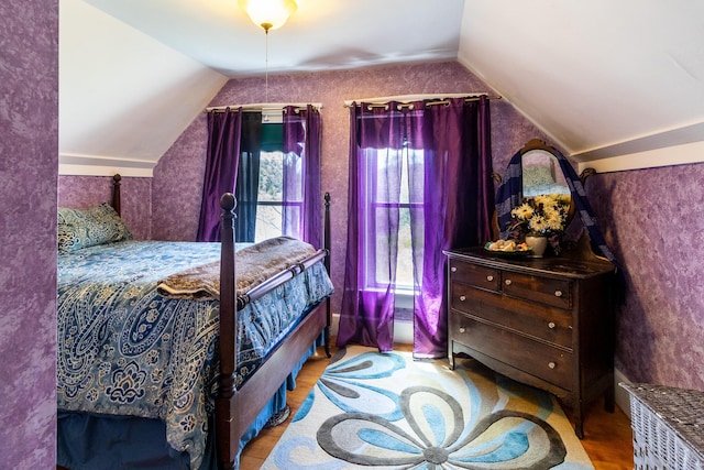 590 Main St, East Machias, ME 04630 - bedroom featuring vaulted ceiling and wood finished floors