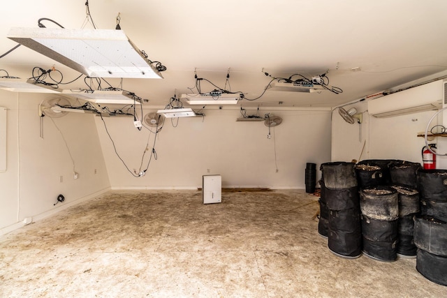 590 Main St, East Machias, ME 04630 - basement with a wall mounted air conditioner and baseboards