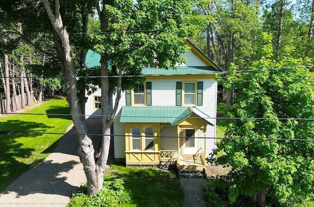 12 Park Ave, Newport, ME 04953 - view of front of house featuring metal roof and a porch
