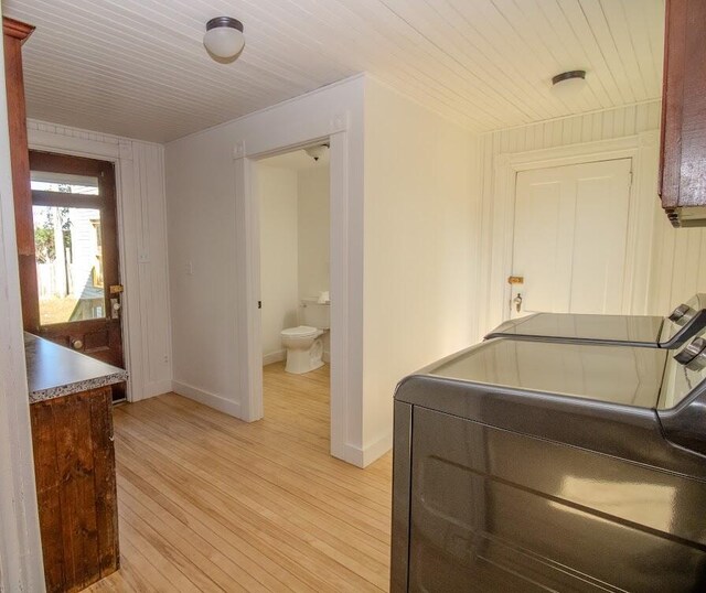 12 Park Ave, Newport, ME 04953 - laundry room with washer / clothes dryer, light wood-style floors, baseboards, and wooden ceiling