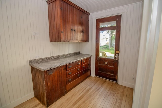 12 Park Ave, Newport, ME 04953 - doorway featuring light wood-type flooring and wooden walls