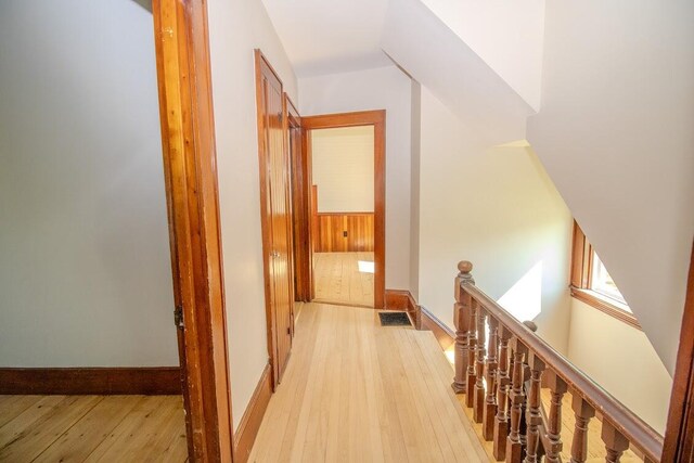 12 Park Ave, Newport, ME 04953 - hallway with an upstairs landing, light wood-style flooring, and baseboards