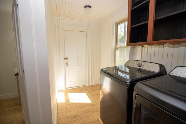 12 Park Ave, Newport, ME 04953 - laundry area with independent washer and dryer and light wood-type flooring