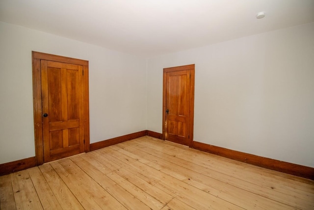 12 Park Ave, Newport, ME 04953 - spare room with baseboards, light wood-style floors, and a smoke detector