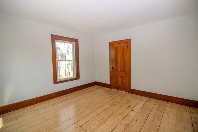 12 Park Ave, Newport, ME 04953 - empty room featuring baseboards and light wood-type flooring