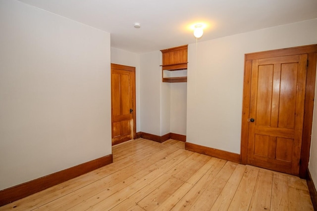 12 Park Ave, Newport, ME 04953 - unfurnished room featuring baseboards and light wood-type flooring