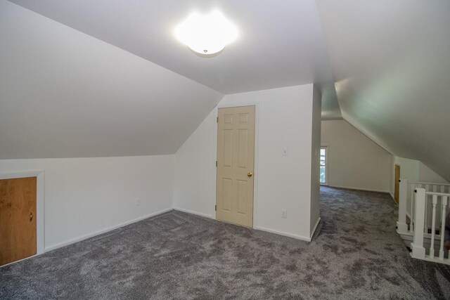 12 Park Ave, Newport, ME 04953 - bonus room with carpet floors, vaulted ceiling, and baseboards
