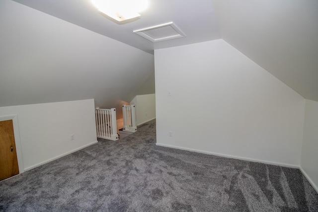 12 Park Ave, Newport, ME 04953 - bonus room with attic access, carpet, vaulted ceiling, and baseboards