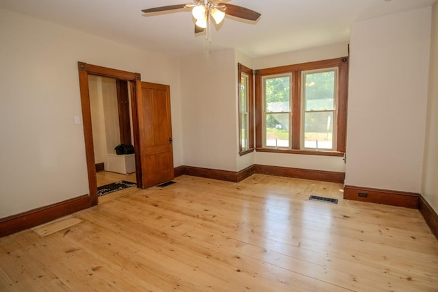 12 Park Ave, Newport, ME 04953 - spare room with ceiling fan, baseboards, and light wood finished floors