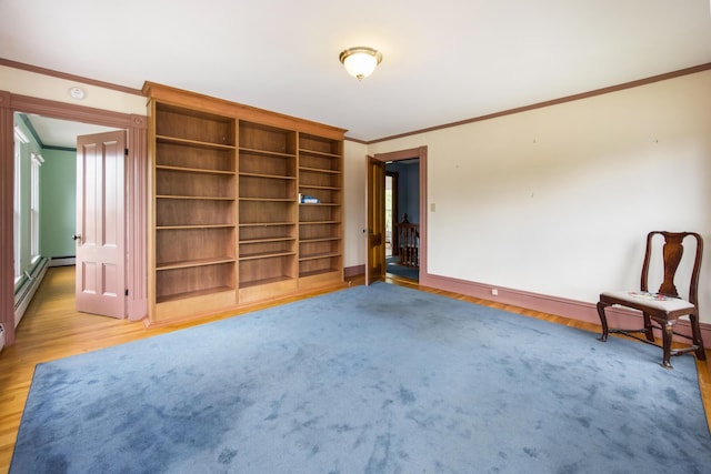 123 Main St, Newport, ME 04953 - unfurnished room with ornamental molding, wood finished floors, baseboards, and baseboard heating
