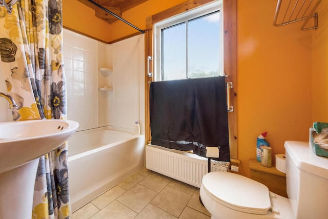 123 Main St, Newport, ME 04953 - bathroom with toilet, radiator heating unit, shower / tub combo, and tile patterned floors