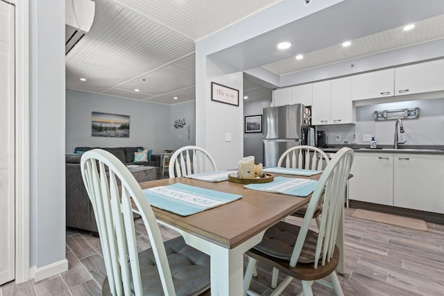 131 Temple Ave Unit 26, Old Orchard Beach, ME 04064 - dining room featuring wood finish floors and recessed lighting