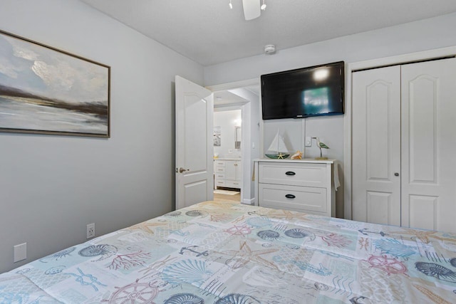 131 Temple Ave Unit 26, Old Orchard Beach, ME 04064 - bedroom featuring a closet and a ceiling fan