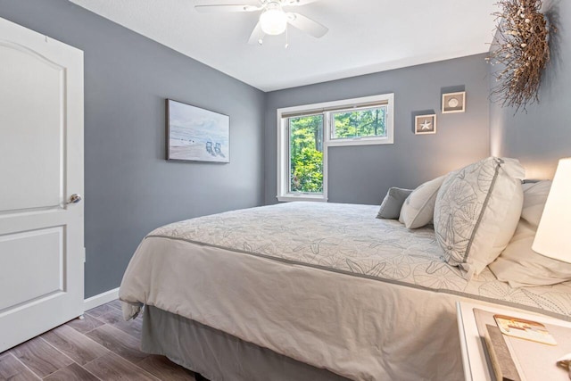 131 Temple Ave Unit 26, Old Orchard Beach, ME 04064 - bedroom with wood finished floors, baseboards, and ceiling fan