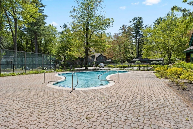 131 Temple Ave Unit 26, Old Orchard Beach, ME 04064 - community pool with a patio and view of wooded area