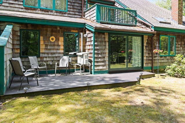 131 Temple Ave Unit 26, Old Orchard Beach, ME 04064 - rear view of house featuring a balcony, a wooden deck, a chimney, and a shingled roof