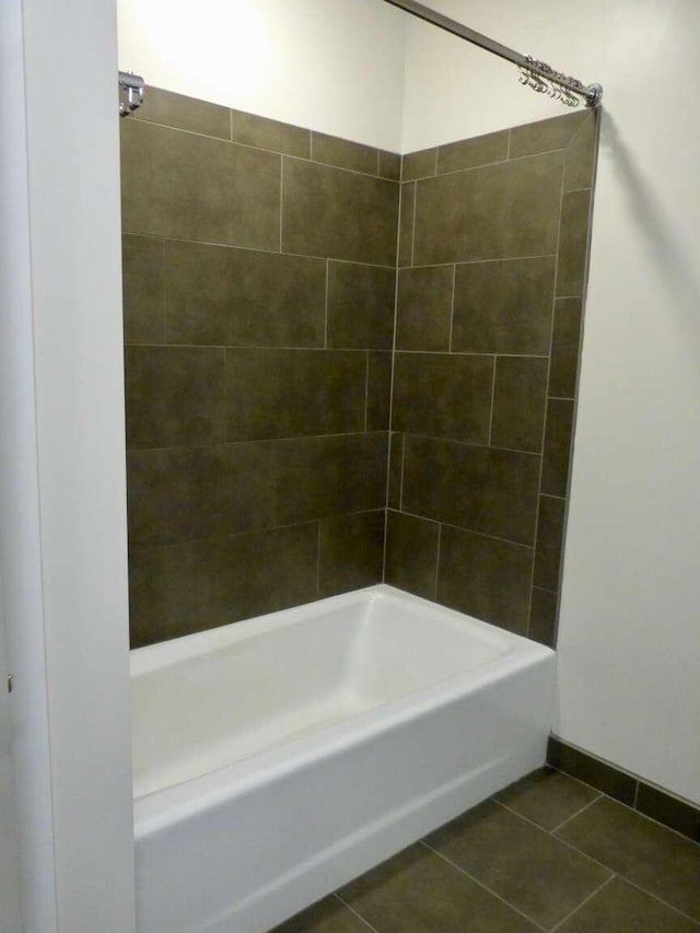 65 Munjoy St Unit 4, Portland, ME 04101 - bathroom featuring tile patterned flooring and shower / tub combination