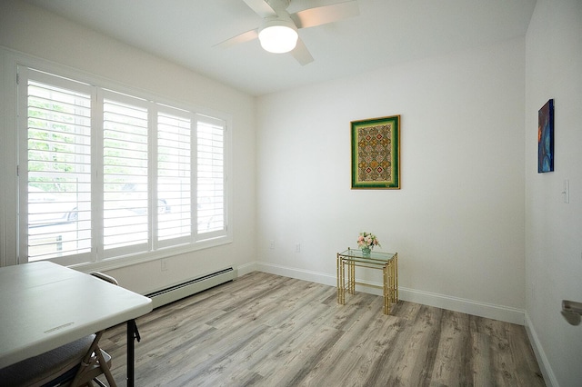 11 Unity Ln Unit 11, Windham, ME 04062 - office area with a baseboard radiator, light wood-style floors, a ceiling fan, and baseboards