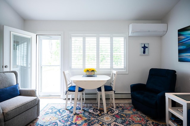 11 Unity Ln Unit 11, Windham, ME 04062 - dining room featuring a wall mounted AC, healthy amount of natural light, and a baseboard heating unit