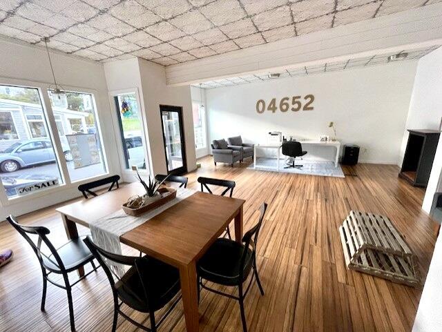 32 Water St, Lubec, ME 04652 - dining room featuring wood-type flooring and baseboards