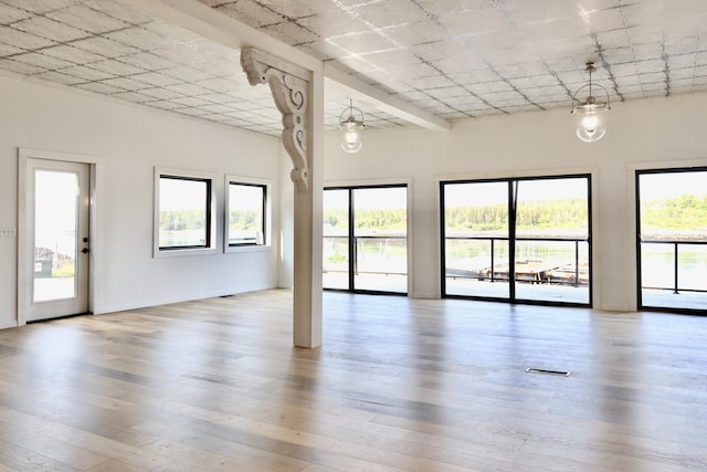 32 Water St, Lubec, ME 04652 - unfurnished room featuring plenty of natural light and hardwood / wood-style flooring