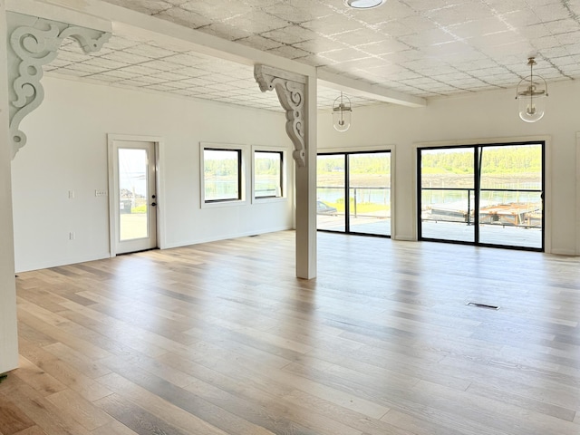 32 Water St, Lubec, ME 04652 - empty room featuring light wood-type flooring and baseboards