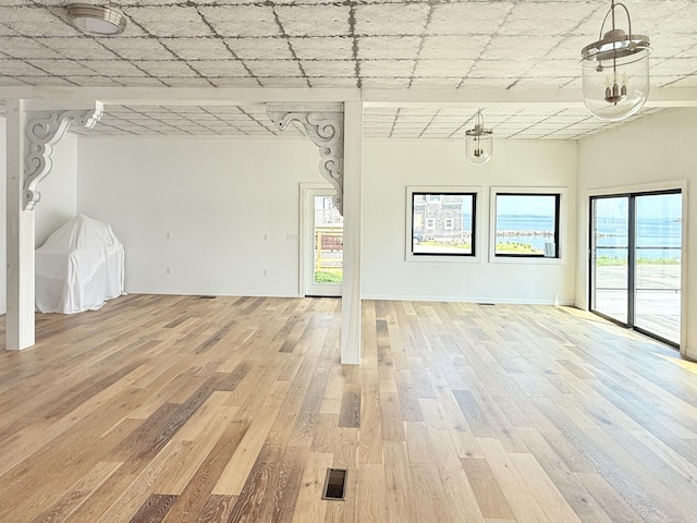 32 Water St, Lubec, ME 04652 - unfurnished living room featuring light wood-style floors