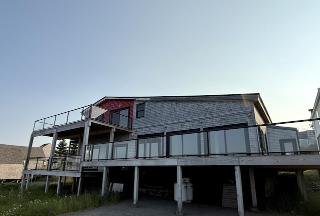 32 Water St, Lubec, ME 04652 - back of property with a balcony