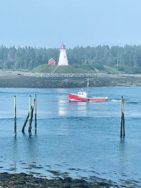 32 Water St, Lubec, ME 04652 - water view featuring a heavily wooded area