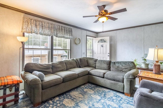 833 Sedgwick Ridge Rd, Sedgwick, ME 04676 - living room featuring a ceiling fan and ornamental molding
