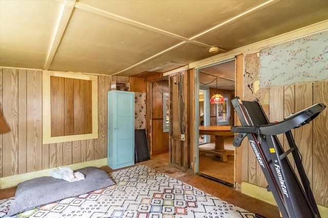 833 Sedgwick Ridge Rd, Sedgwick, ME 04676 - interior space featuring wood walls and carpet flooring