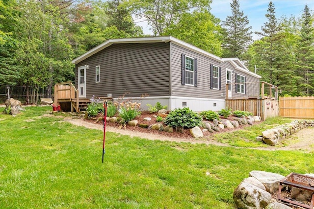 833 Sedgwick Ridge Rd, Sedgwick, ME 04676 - view of property exterior featuring a deck and crawl space