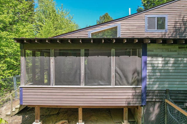 200 Flanders Pond Rd, Sullivan, ME 04664 - view of side of home featuring a sunroom