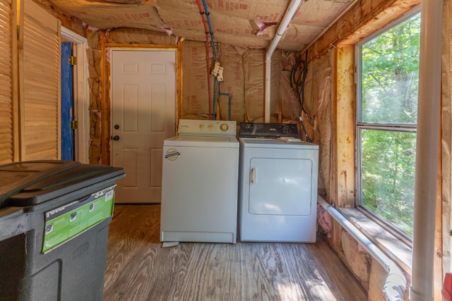 200 Flanders Pond Rd, Sullivan, ME 04664 - washroom with washer and clothes dryer and wood finished floors