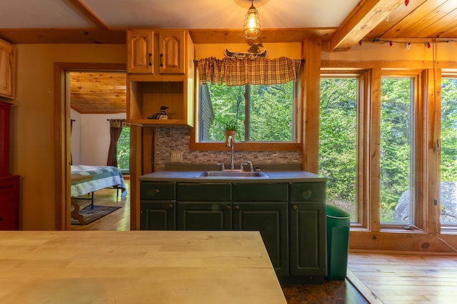 200 Flanders Pond Rd, Sullivan, ME 04664 - kitchen with a sink, dark wood-type flooring, healthy amount of natural light, beam ceiling, and butcher block counters
