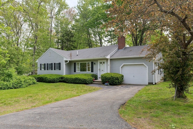 6 Acacia Rd, Kennebunkport, ME 04046 - ranch-style house featuring a garage, a chimney, driveway, a front lawn, and a shingled roof