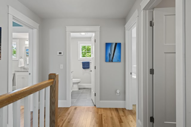15 Adena Way, Kennebunk, ME 04043 - corridor featuring light wood finished floors and baseboards