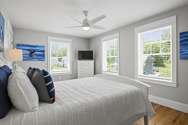 15 Adena Way, Kennebunk, ME 04043 - bedroom with wood finished floors, baseboards, and ceiling fan