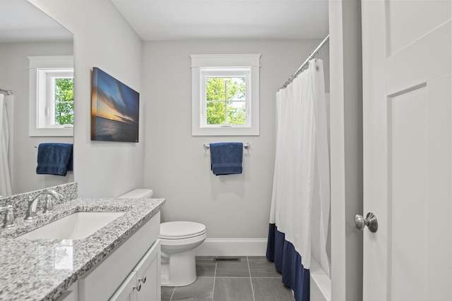 15 Adena Way, Kennebunk, ME 04043 - bathroom with vanity, healthy amount of natural light, toilet, and baseboards