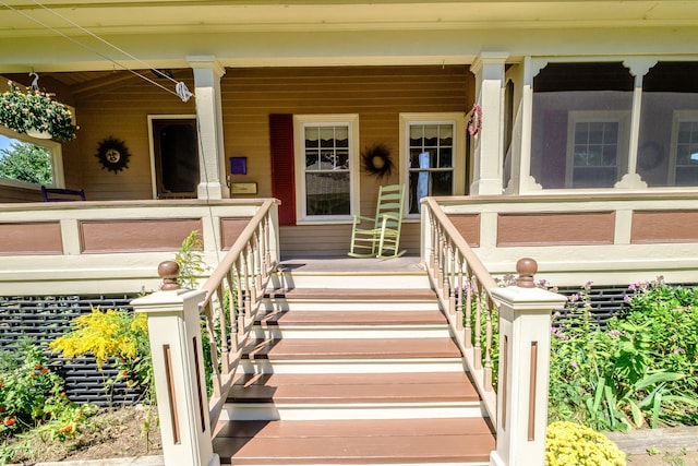doorway to property featuring covered porch