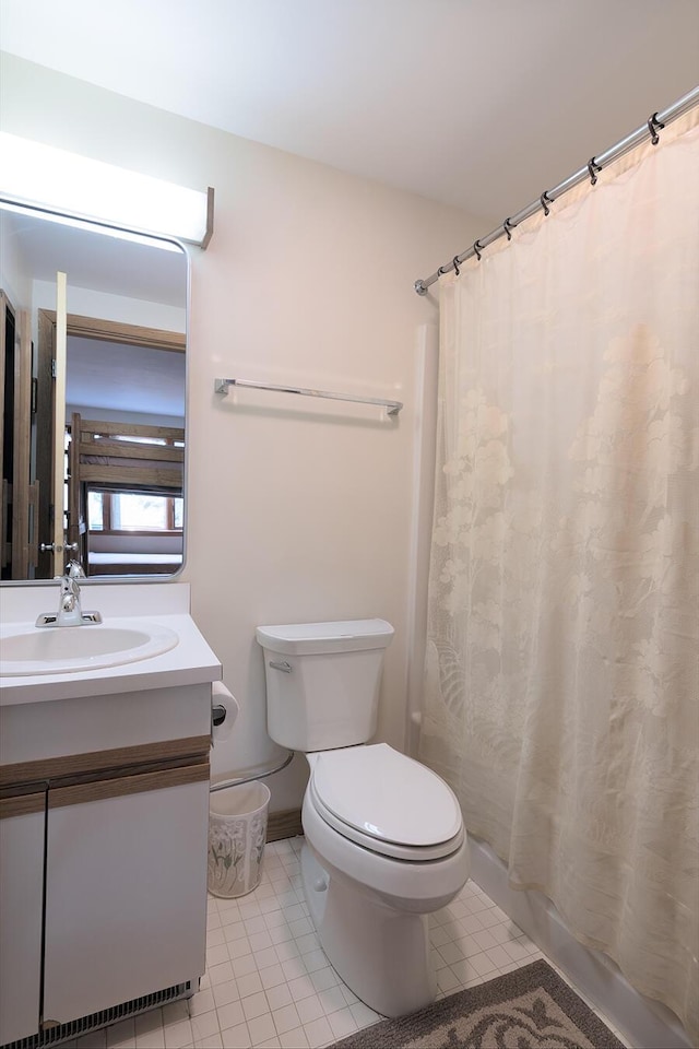 2396 Hemlock Dr Unit 2396, Carrabassett Valley, ME 04947 - bathroom with vanity, toilet, and curtained shower