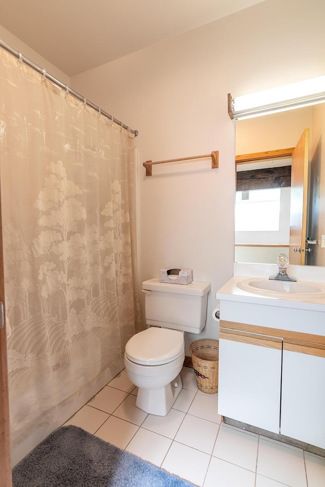 2396 Hemlock Dr Unit 2396, Carrabassett Valley, ME 04947 - full bath featuring vanity, toilet, tile patterned flooring, and curtained shower