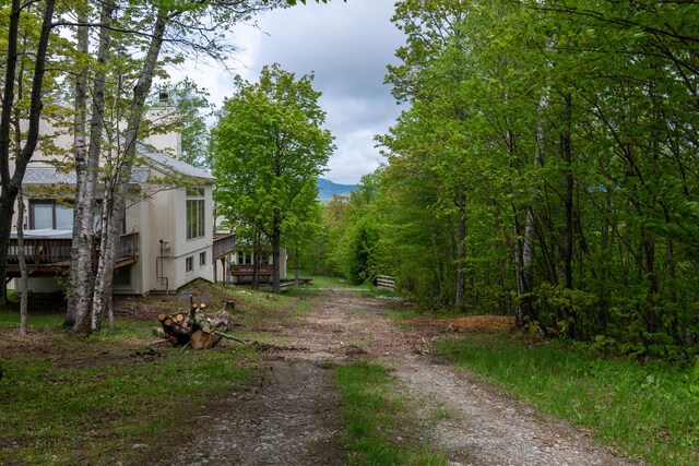 2396 Hemlock Dr Unit 2396, Carrabassett Valley, ME 04947 - view of dirt / gravel road with a wooded view