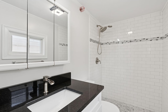 5 Kinney Ave Unit 303, Old Orchard Beach, ME 04064 - bathroom with vanity, tiled shower, ornamental molding, and toilet
