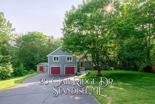 20 Oak Ridge Dr, Standish, ME 04084 - view of front facade with a front lawn