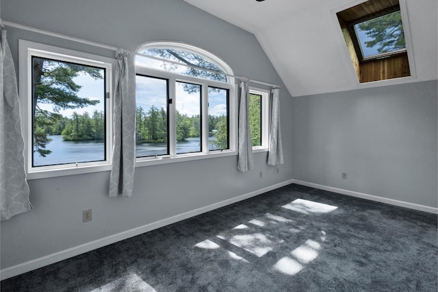 30 Otter Cove Ln, North Berwick, ME 03906 - additional living space featuring vaulted ceiling, dark colored carpet, baseboards, and ceiling fan